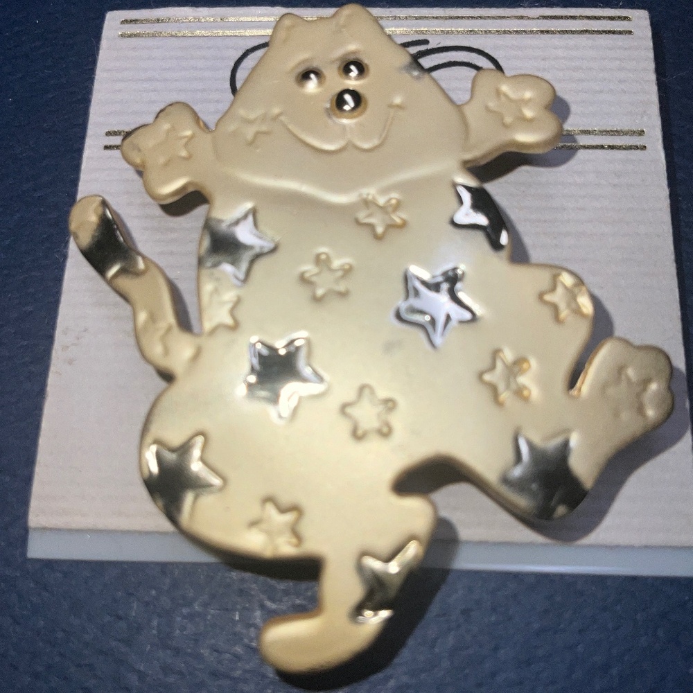 Sylvestri Dancing Cat With Stars brooch  gold tone with shiny gold stars